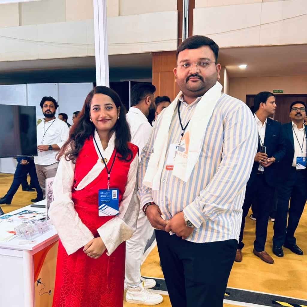 Tripjyada representatives meeting people at a travel industry event