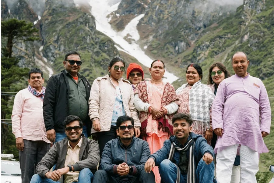 Travellers of different generations enjoying a holiday together in the mountains